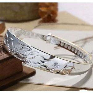 FINE 999 (99.9%) SILVER SPRING BIRD ADJUSTABLE BANGLE